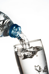 water flowing from bottle to glass