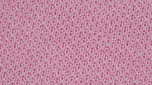 Textile background - 100 percent pink white cotton fabric. Weave pattern of threads close up. Macro shoot