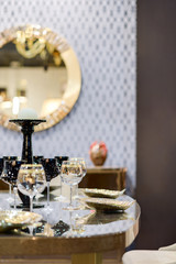 beautiful tableware on a glossy table, modern kitchen