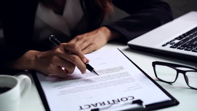 Young Businesswoman signing contract, Partnership Successful deal after meeting