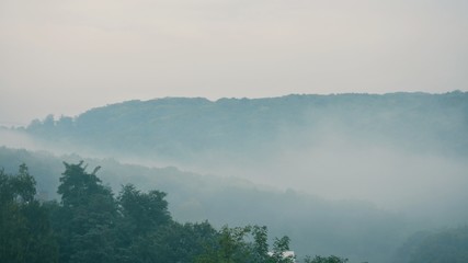 Panoramic view of morning fog in the mountains