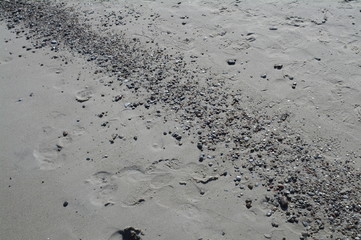 Kleine Steine am Strand