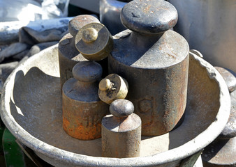 old weights and scales on a background