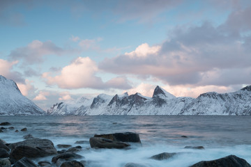 Plakat Panorama of snowy fjords and mountain range, Senja, Norway Amazing Norway nature seascape popular tourist attraction. Best famous travel locations. beautiful sunset within the amazing winter landscape