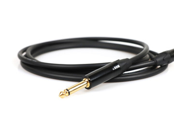 electric guitar audio jack with black cable isolated on white background