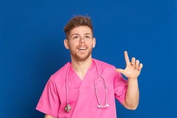 African doctor wearing a pink uniform