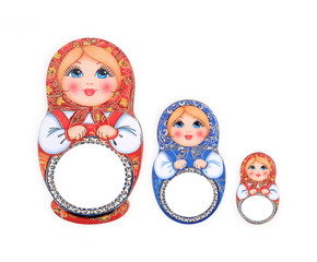 Souvenir (magnet) from Russia in the form of dolls isolated on white background