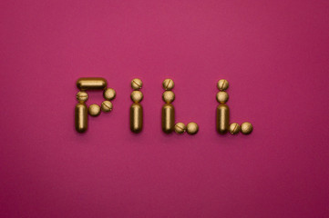 pill word on pink background - 328933084