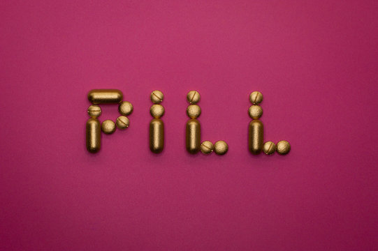 pill word on pink background
