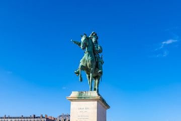 Monument by Louis XIV in front of Versailles Palace. Palace Versailles was a royal chateau. It was...