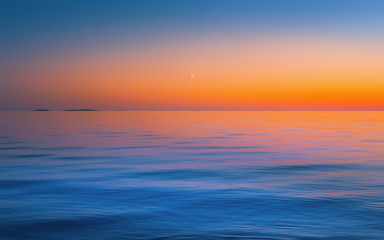 Blue Seascape With Fiery Golden Sunset - 328933819