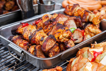 Juicy and grilled skewers on the grill