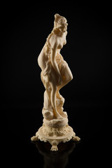Fototapeta premium plaster sculpture on a black background
