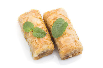 traditional arabic sweets isolated on white background. side view