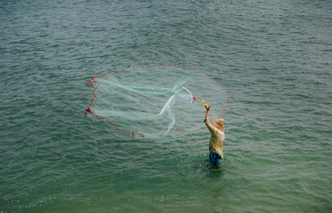 cast net fishing in fort kochi
