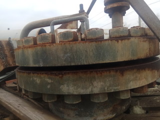 rusty metal structures at a scrap metal dump