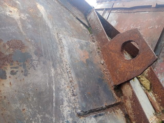 rusty metal structures at a scrap metal dump