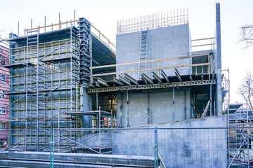 Concrete formwork with a folding mechanism and floor beams on construction site