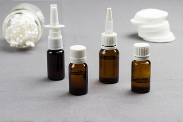 Glass Bottle with medicines. Cold remedies. Medical concepts and medicines