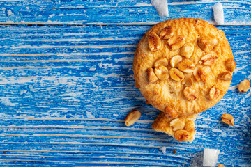 Peanut cookies on a blue wooden table.