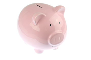 Pink piggy bank isolated on white background
