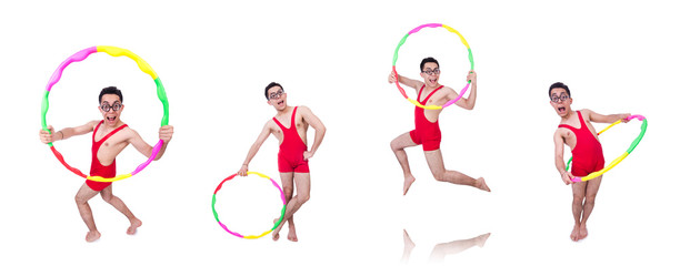 Funny sportsman with hula hoop on white