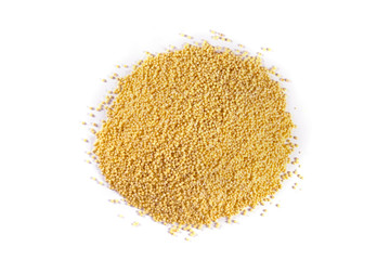 A pile of wheat groats on a white isolated background. View from above.