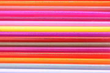 background of colored wooden pencils