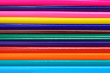 background of colored wooden pencils