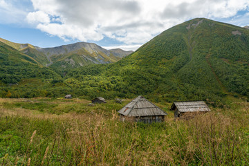 Abandoned mountain houses in Svaneti region of Georgia cloudy summer day