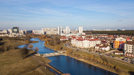 Areal view of residential housing area and water channel.