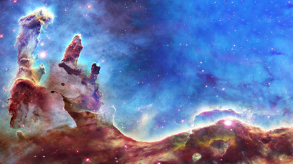 Obraz na płótnie Canvas Pillars of creation and space dust in deep space. . Elements of this image were furnished by NASA