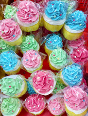 Muffin with Pink ,Blue and Green Cream 