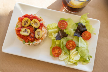 Light salad dish with tuna and olives