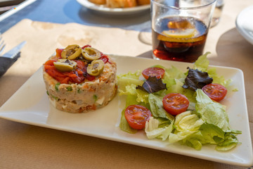 Light salad dish with tuna and olives