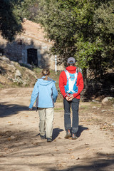 Young couple tourists trekking on the Spanish mountain Montseny