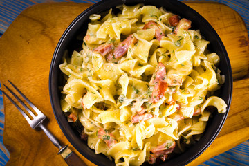 Pasta with sausage and cheese.