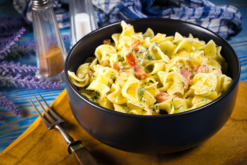 Pasta with sausage and cheese.