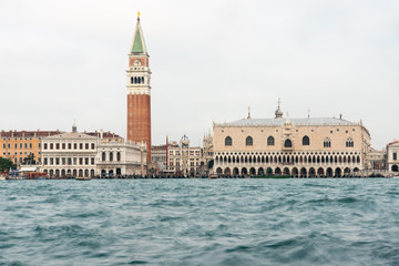 Fototapeta na wymiar View from Piazza San Giorgio Maggiore to Palazzo Ducale and Marcus Square during Bad Weather and High Tide, Venice/Italy