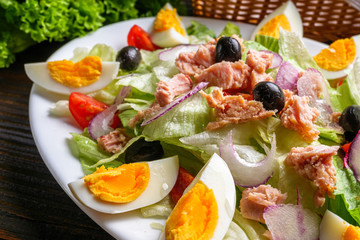tuna salad on dark wooden rustic background