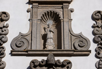 Monastery of Sao Romao de Neiva front facade ornamented detail. It is a Benedictine monastery from 11th century located in Minho region, Portugal