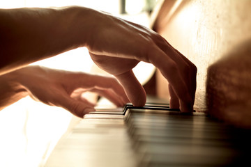 Hands Playing Piano