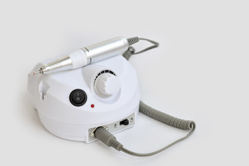 White cutter for manicure on a white background