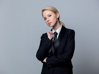 businesswoman in a classic black business suit
