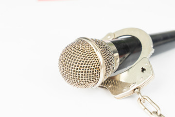Closeup of microphone with handcuffs