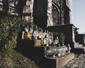 little glass lamps on stairs of chuch in Poland