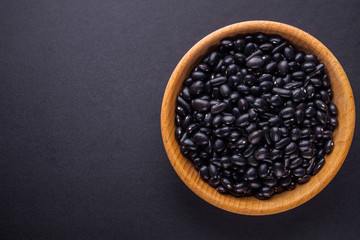fresh organic natural beans on black background