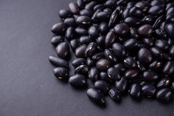 fresh organic natural beans on black background