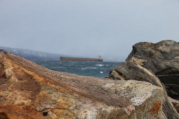 Cargo ship close to the coast