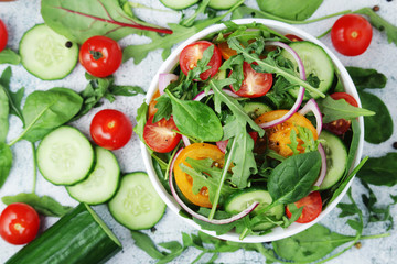 A bowl full of vegetable salad	
